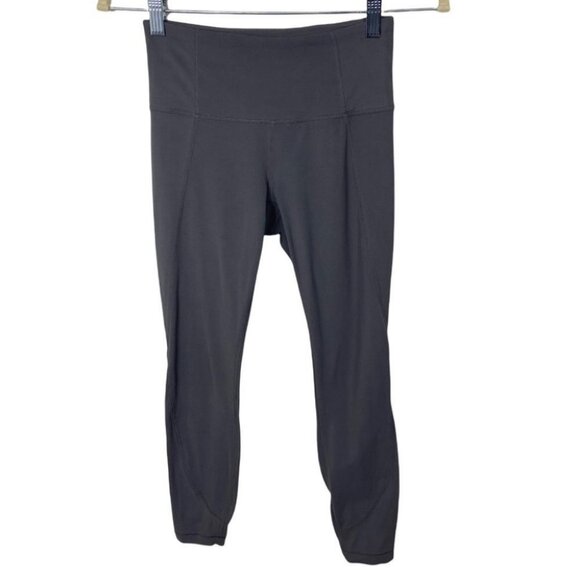 Athleta Silver Bells Stash Pocket Salutation Size XS Leggings Grey Compression - Picture 3 of 15